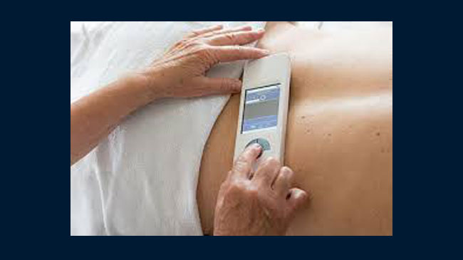 applying the nes miHealth on-body to the back